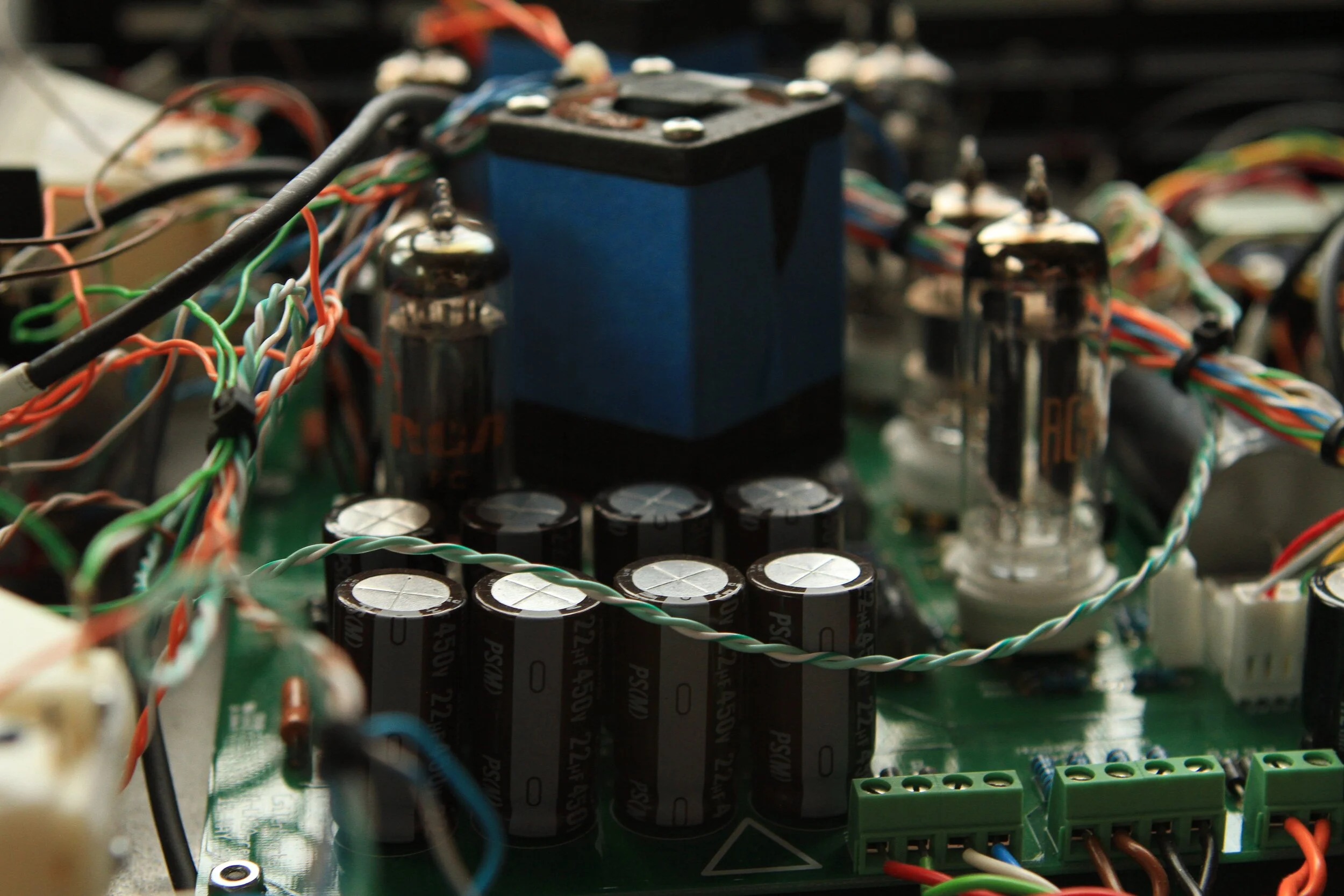 This optical gain control unit was built in a salvaged relay enclosure that plugs into a octal socket. The illumination is a EL panel, like the originals, with light dependent resistors (LDR) to attenuate the signal. The LDR simply operates in a vol