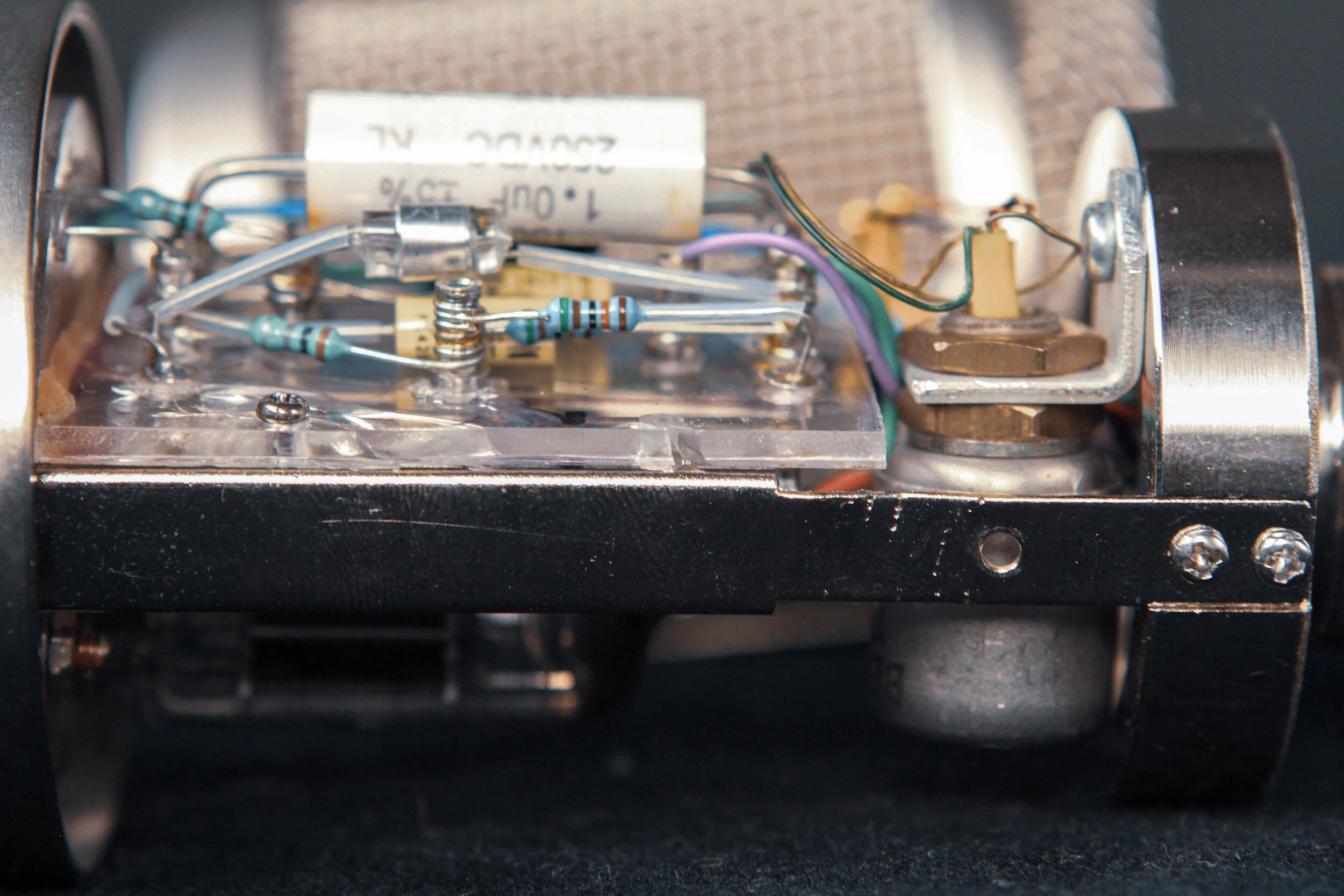 A 10:1 Beyerdynamic transformer is used in reverse from the tube plate, blocked with a 1uF film capacitor.