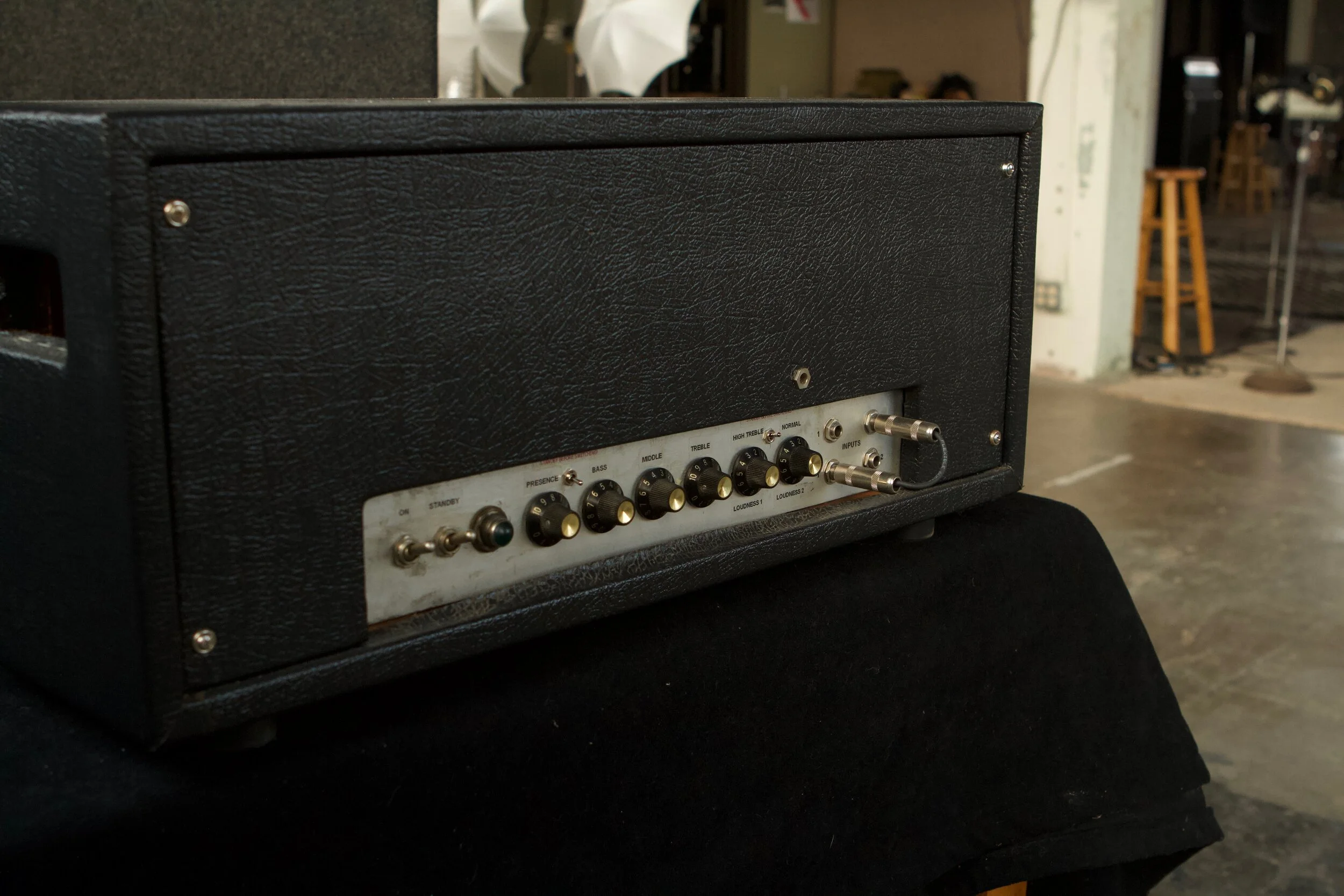 This amp build follows the 5F6A schematic, which was borrowed by Jim Marshall for the JTM-45 circuit. Blackface reverb is added with the control knob on the back panel. The quad of 6L6 power tubes drive a vintage ?60s Twin Reverb output transformer,